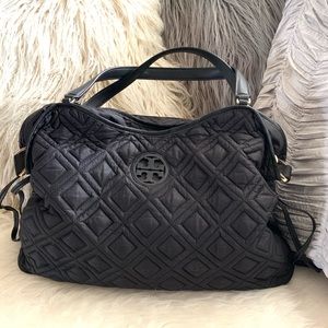Tory Burch quilted diaper bag with changing pad.
